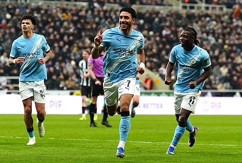 Manchester City's Omar Marmoush celebrates after scoring during the fifth round FA Cup soccer match between Newcastle and Manchester City in Newcastle, England.