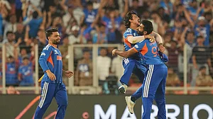 AP Photo/Rafiq Maqbool : Ishan Kishan celebrates alongside teammates after taking sensational catch during India vs New Zealand ICC T20 World Cup 2026 final.