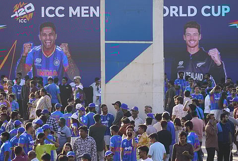 Cricket fans arrive for the T20 World Cup cricket final match between India and New Zealand in Ahmedabad.