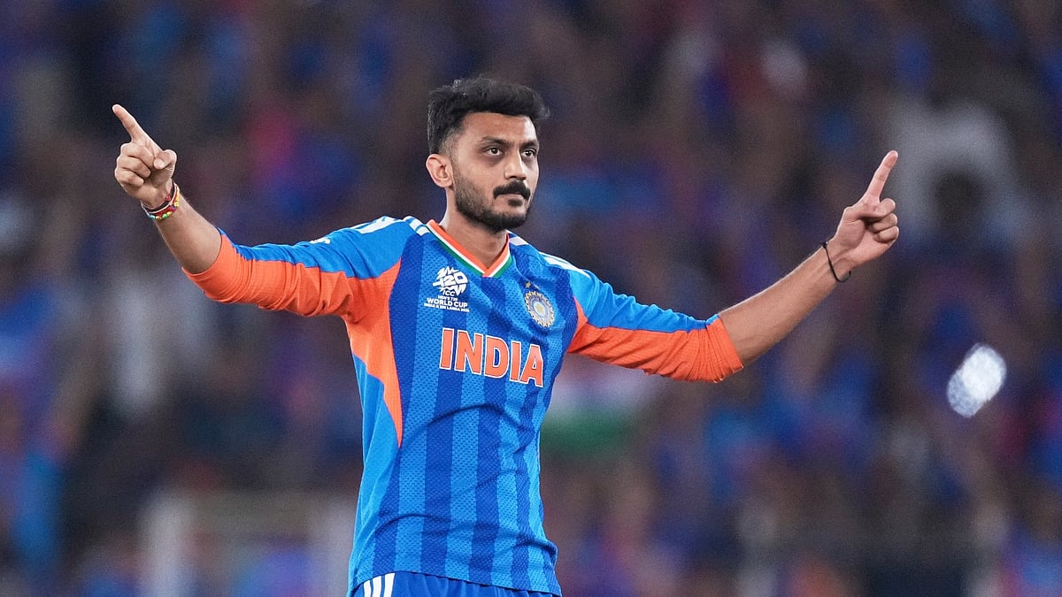 India's Axar Patel celebrates the wicket of New Zealand's Finn Allen during the T20 World Cup cricket final match between India and New Zealand in Ahmedabad, India, Sunday, March 8, 2026.  - AP Photo/Ajit Solanki
