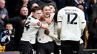 FA Cup Fifth Round Wrap: Third-Tier Port Vale Shock Sunderland; Southampton’s Late Penalty Downs Fulham | Photo: AP/Nick Potts : Port Vale's Ben Waine celebrates with teammates after scoring his side's first goal of the game, during the FA Cup fifth round soccer match between Sunderland and Port Vale, in Stoke on Trent, England, Sunday March 8, 2026.