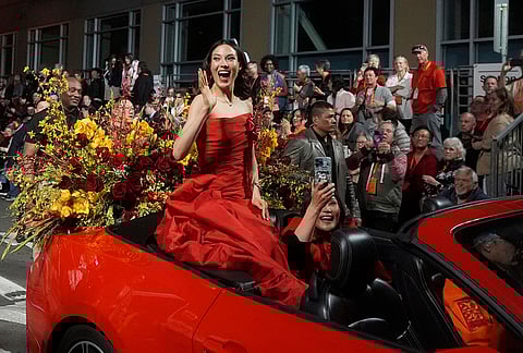 Olympic gold medalist and Grand Marhsal Eileen Gu waves during the Chinese New Year Parade in San Francisco.