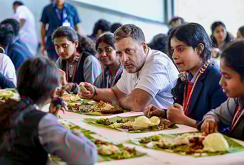 Leader of Opposition in the Lok Sabha Rahul Gandhi interacts with female students while having a meal on the occasion of International Women's Day, in Kerala. 