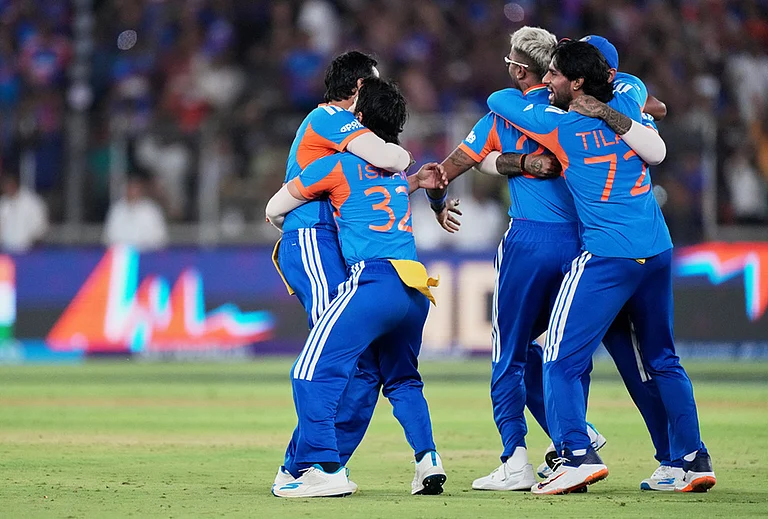 India's players celebrate after winning the T20 World Cup cricket final match against New Zealand in Ahmedabad. - | Photo: AP/Ajit Solanki