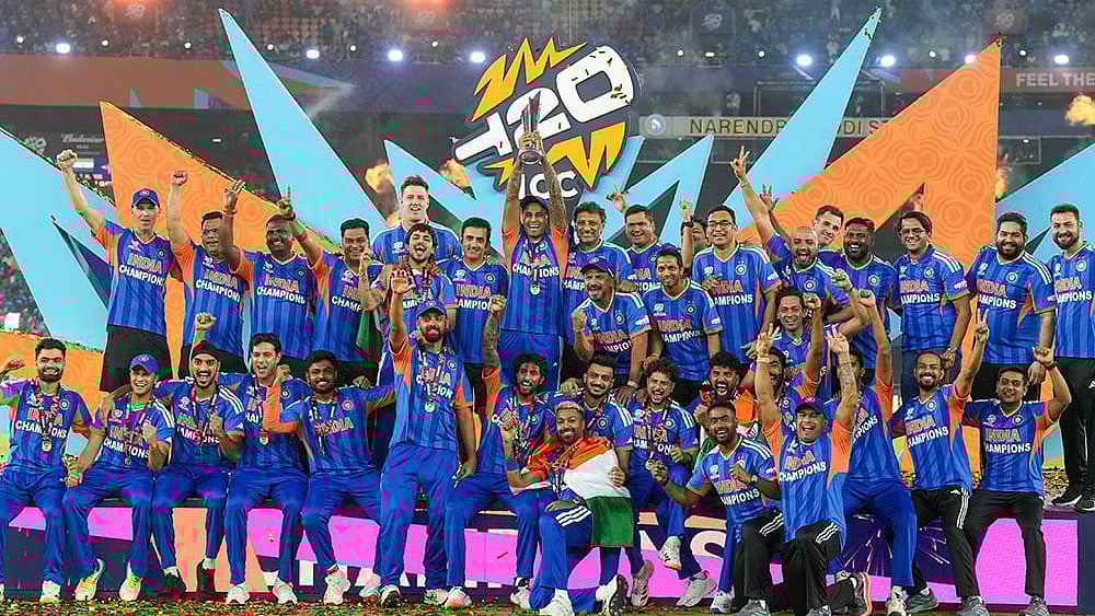 India's captain Suryakumar Yadav lifts the tournament trophy with teammates after winning the ICC Men's T20 World Cup 2026, at Narendra Modi Stadium, in Ahmedabad, Gujarat.
 - | Photo: PTI/Shailendra Bhojak