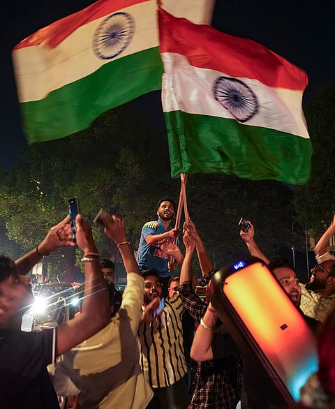 New Delhi: Cricket fans celebrate after India defeated New Zealand to win the ICC Men's T20 World Cup 2026 final, in New Delhi.