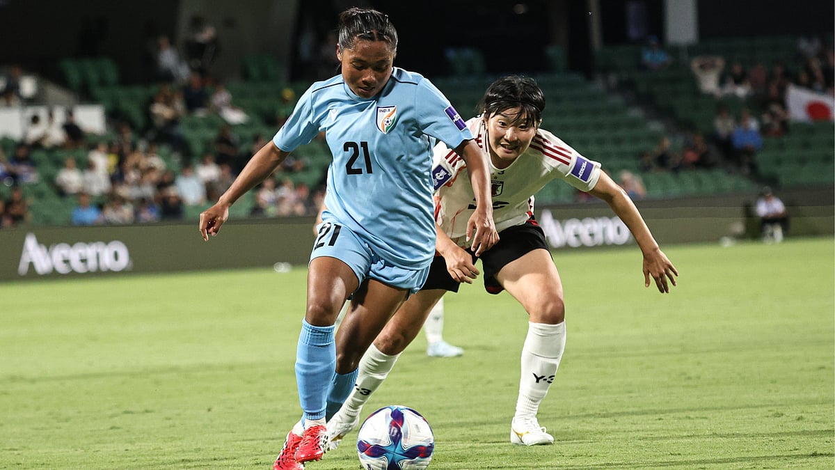 India's Sarita Yumnam with the ball during the AFC Women's Asian Cup match against Japan on March 7, 2026. - | Photo: AIFF