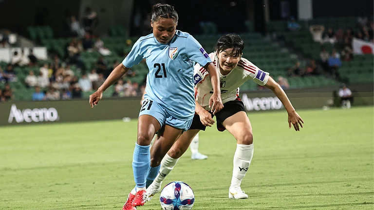 India's Sarita Yumnam with the ball during the AFC Women's Asian Cup match against Japan on March 7, 2026. - | Photo: AIFF