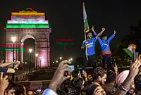 | Photo: PTI : Cricket fans celebrate after India defeated New Zealand to win the ICC Men's T20 World Cup 2026 final near India Gate, in New Delhi.