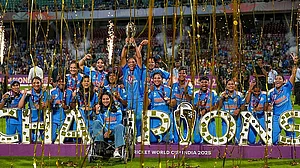 PTI : India’s players celebrate with the trophy during the presentation ceremony after winning the ICC Women's World Cup 2025, at the DY Patil Stadium in Navi Mumbai.