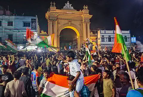 Cricket fans celebrate after India defeated New Zealand to win the ICC Men's T20 World Cup 2026 final, in Bardhaman district of West Bengal.