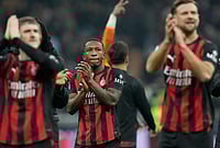 | Photo: AP/Luca Bruno : AC Milan's Pervis Estupinan, centre, celebrates after the Serie A soccer match between AC Milan and Inter Milan, in Milan, Italy.