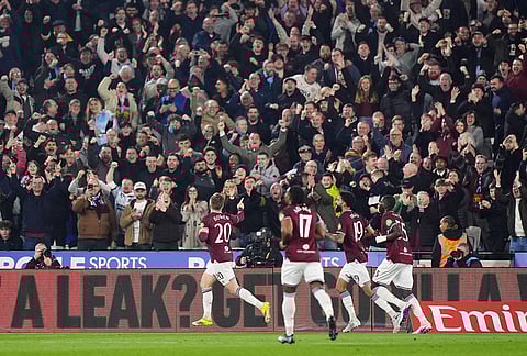 West Ham United's Jarrod Bowen, left, celebrates scoring during the English FA Cup fifth round soccer match between West Ham United and Brentford in London.
