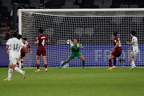 India's goalkeeper Panthoi Chanu Elangbam makes a save during the Women's Asian Cup soccer match between India and Taiwan in Sydney.