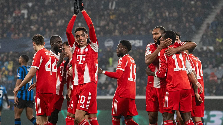Bayern Munich players celebrating a goal against Atalanta in the UEFA Champions League 2025-26. - FCBayernEN/X