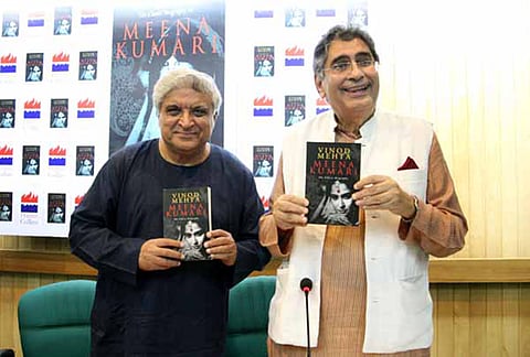 Vinod Mehta, Editorial Chairman in Outlook Group, with Javed Akhtar, poet, lyricist and scriptwriter, during his book launch in New Delhi on Oct 04, 2013.