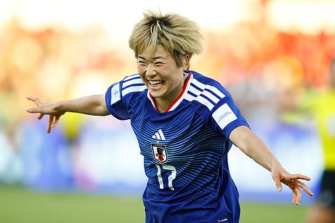 Japan's Maika Hamano celebrates after scoring her team's second goal during the Women's Asian Cup soccer match between Japan and Vietnam in Perth, Australia.