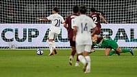 (AP Photo/Rick Rycroft) : Taiwan's Chen Yu-chin, left, scores her side's third goal during the Women's Asian Cup soccer match between India and Taiwan in Sydney, Monday, March 10, 2026