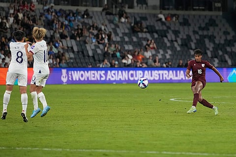 India's Manisha Kalyan takes a free kick during the Women's Asian Cup soccer match between India and Taiwan in Sydney.