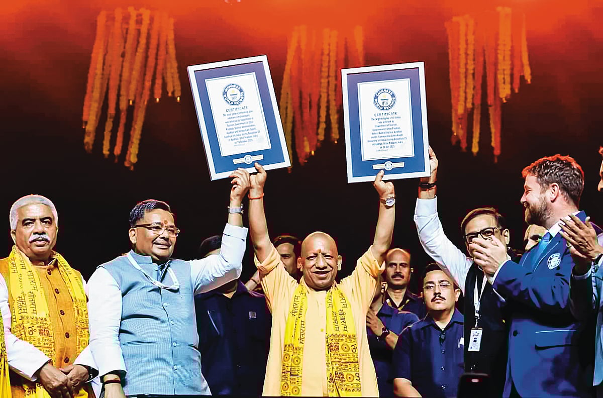 Chief Minister Yogi Adityanath with the Guinness World Records citation, conferred for setting a new record by lighting 26,17,215 diyas along the banks of the Saryu river on October 19, 2025, the latest in a series of consecutive records achieved by the Uttar Pradesh government in Ayodhya - null