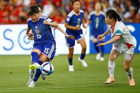 Japan's Aoba Fujino scores her team's third goal during the Women's Asian Cup soccer match between Japan and Vietnam in Perth, Australia.