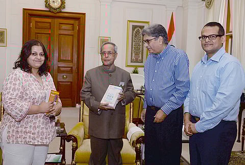 Vinod Mehta, Indranil Roy, and Pranab Mukherjee at the Outlook Getaways launch 