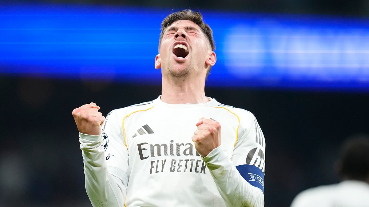 Real Madrid's Federico Valverde celebrates after scoring during a first leg round of 16 Champions League soccer match between Real Madrid and Manchester City in Madrid, Spain, Wednesday, March 11, 2026.  - (AP Photo/Jose Breton)