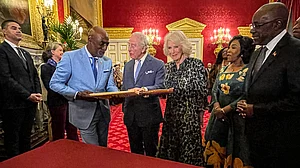 PTI : Former West Indies cricketer Sir Viv Richards presents a special cricket bat to King Charles III and Queen Camilla at St. James's Palace in London.