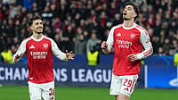 | Photo: AP/Martin Meissner : Arsenal's Kai Havertz reacts after scoring a penalty, his side's first goal, during the Champions League round of 16 first leg soccer match between Bayer Leverkusen and Arsenal FC in Leverkusen, Germany, Wednesday, March 11, 2026. 