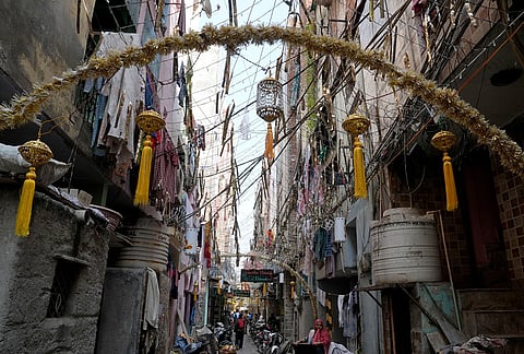 The neighbourhood, shared by Hindus and Muslims, adorned with Ramzan decorations.
