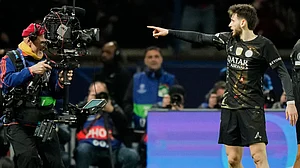 | Photo: AP/Michel Euler : PSG's Khvicha Kvaratskhelia celebrates after scoring his side's fourth goal during the first leg of the Champions League round of 16 soccer match between Paris Saint-Germain and Chelsea, in Paris, Wednesday, March 11, 2026.