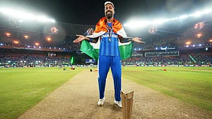 AP : Hardik Pandya celebrates with the trophy after India won the T20 World Cup final against New Zealand in Ahmedabad.