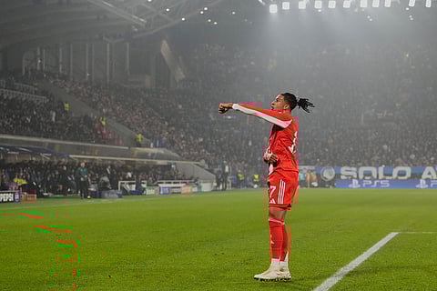 Bayern's Michael Olise celebrates after scoring his side's fifth goal during the Champions League round of 16 soccer match between Atalanta and FC Bayern Munich in Bergamo, Italy.