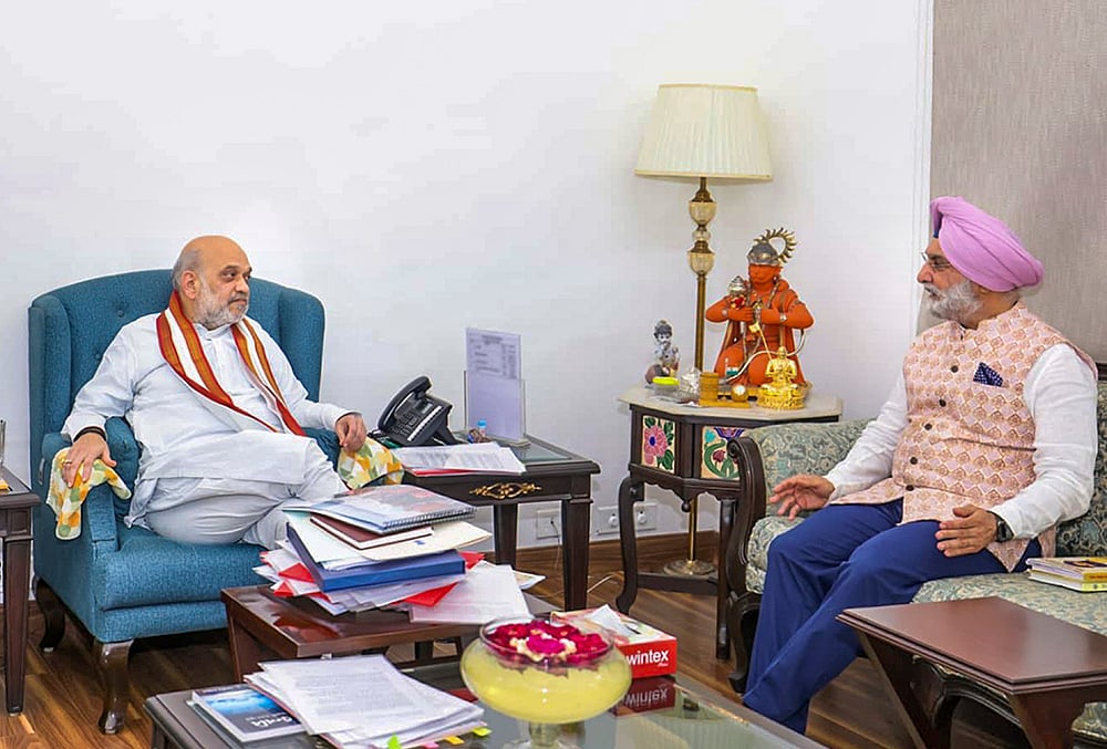 Amit Shah meets Taranjit Singh Sandhu