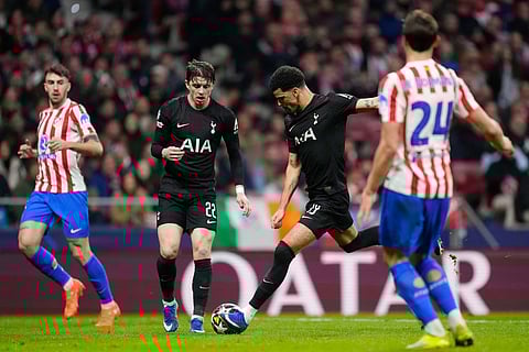 Tottenham's Dominic Solanke scores his side's second goal during the first leg of the Champions League round of 16 soccer match between Atletico Madrid and Tottenham in Madrid, Spain.