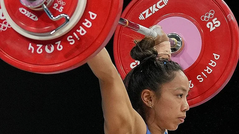 Mirabai Chanu Saikhom of India competes during the women's 49kg weightlifting event at the 2024 Summer Olympics in Paris, France. - File/AP