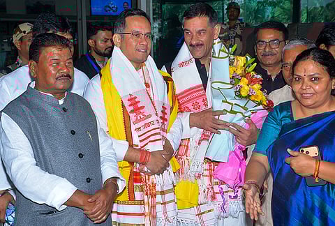 Congress MP Gaurav Gogoi, second left, party leader Bhanwar Jitendra Singh, second right, and others at Birsa Munda Airport, in Ranchi, Jharkhand.