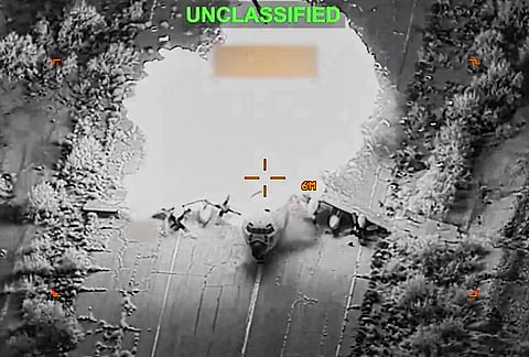 This image released by the US Central Command (CENTCOM) on March 12, 2026 shows a strike targeting a military aircraft during operations against Iranian-linked infrastructure. 