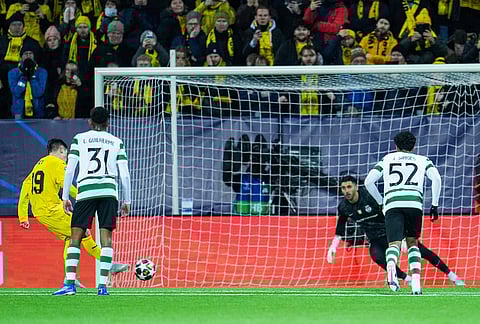 Bodo/Glimt's Sondre Brunstad Fet scores their side's first goal of the game from the penalty spot during the Champions League soccer match between Bodo/Glimt and Sporting Lisbon, in Bodo, Norway.