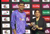 | Photo: AP/Mahmud Hossain Opu : Bangladesh's Nahid Rana, left, received player of the match award from director of the Bangladesh Cricket Board, Rubaba Dowla after Bangladesh won the first one day international cricket match against Pakistan in Mirpur, Bangladesh.