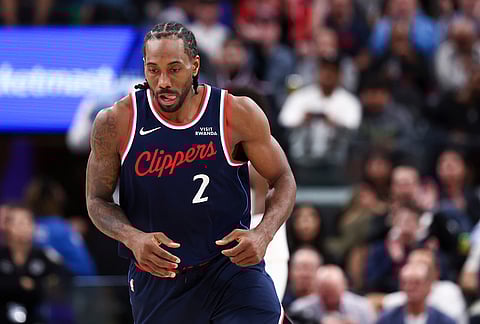 Los Angeles Clippers forward Kawhi Leonard (2) reacts after making a three point basket during the second half of an NBA basketball game against the Minnesota Timberwolves, in Inglewood, California.