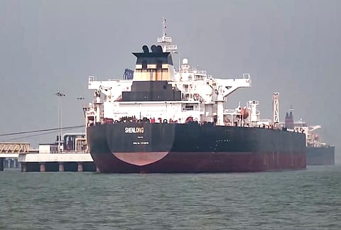 The Liberia-flagged Suezmax tanker Shenlong carrying crude oil berths at the Jawahar Dweep terminal, in Mumbai.