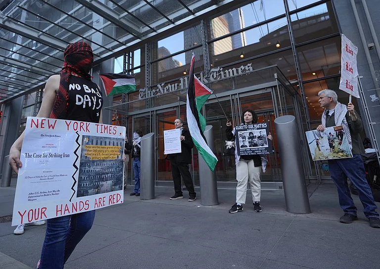 Pro-Palestine activists rally outside the New York Times building to protest the newspaper’s coverage of Israel’s war in Gaza and Iran in New York City, United States, on March 09, 2026. - IMAGO / Anadolu Agency