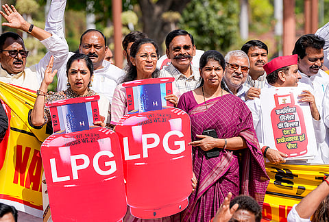 NCP (SP) MP Supriya Sule, DMK MP Kanimozhi Karunanidhi, Samajwadi Party MP Dharmendra Yadav, and others, stage a protest in Parliament premises over 'LPG shortage' during the second part of Budget session, in New Delhi.