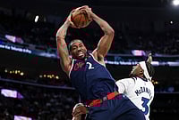 | Photo: AP/Jessie Alcheh : Los Angeles Clippers forward Kawhi Leonard (2) retrieves a rebound against Minnesota Timberwolves forward Jaden McDaniels (3) during the second half of an NBA basketball game in Inglewood, California.