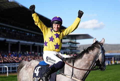 Jockey Paul Townend celebrates on Il Etait Temps after winning the Queen Mother Champion Chase on day two of the 2026 Cheltenham Festival at Cheltenham Racecourse, in Cheltenham, England.