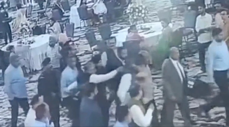 Officials said the accused, who was carrying a licensed pistol, was immediately overpowered by security personnel and detained for questioning. - Video screengrab from X