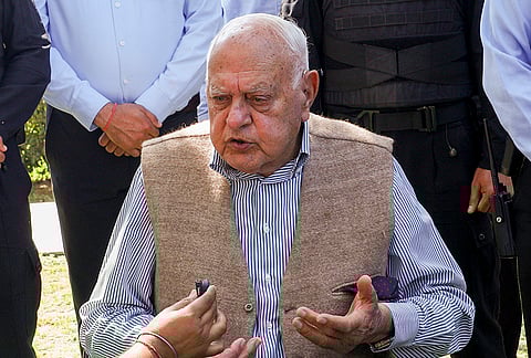 Jammu and Kashmir National Conference president Farooq Abdullah addresses a press conference, at his residence in Jammu. Abdullah had a narrow escape when a gunman allegedly opened fire at him from behind while he was leaving a marriage function on Wednesday. 