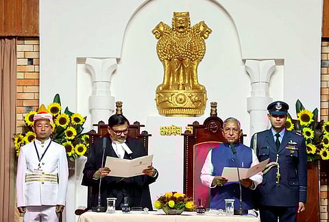 Chief Justice of the Gauhati High Court Justice Ashutosh Kumar administers the oath of office to Nand Kishore Yadav as the Governor of Nagaland, at Lok Bhavan, in Kohima. 