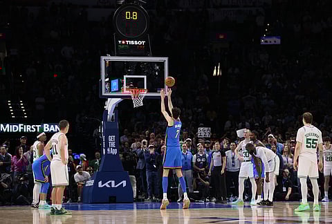 Oklahoma City Thunder center Chet Holmgren (7) shoots the go-ahead free throw late in the second half of an NBA basketball game against the Boston Celtics, in Oklahoma City.